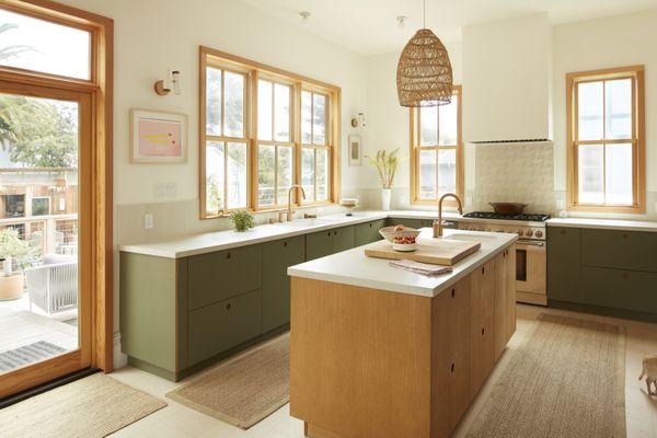 Two-tone modern kitchen for a Victorian duplex conversion