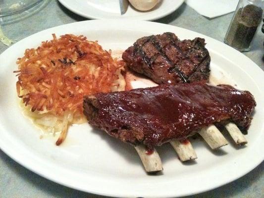 Steak, ribs and hash brown with cheese