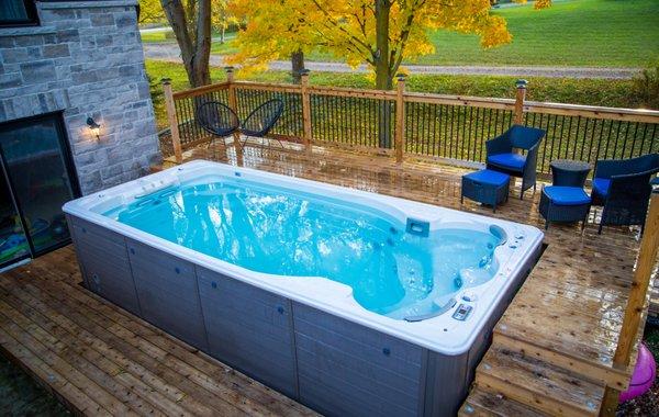 Looking for a Pool? Have you heard about a swim spa? Offering the benefits of hydrotherapy, a personal gym, and outdoor recreation.