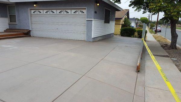 New concrete after removing driveway And concrete pillars. and grading