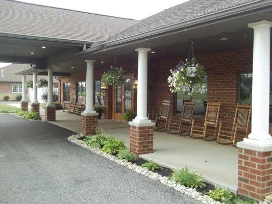 Rocking chairs & beautiful landscaping for our residents to enjoy!