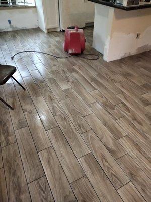 Another tile floor installation 6x24 wood like plank