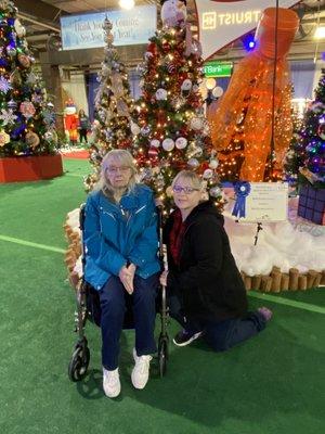 Mom and I in front of some of the trees.