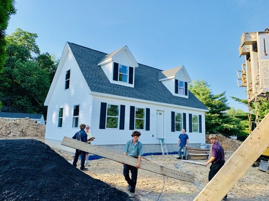 Work in progress on a cape in-law home on shared property.