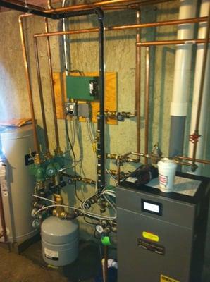 Burnham Alpine with Indirect Fired Hot Water Heater. High Efficient gas system eligible for $1400.00 worth of rebates.