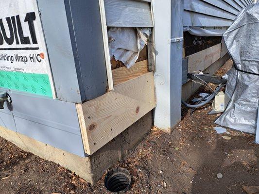 Needed reapirs where wood had rotted. Added Tyvec and flashing tape and then aluminum coil before replacing existing siding.