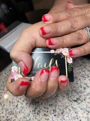 Red French tips for this beautiful. French tips can be any color so come in for a some simple French tips!