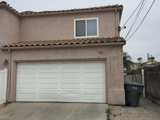 Old weathered with water damaged stucco...