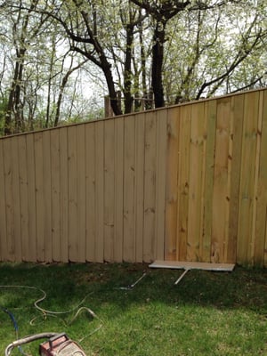 A picture of before and after of a fence stain job in nearby Martinsburg .