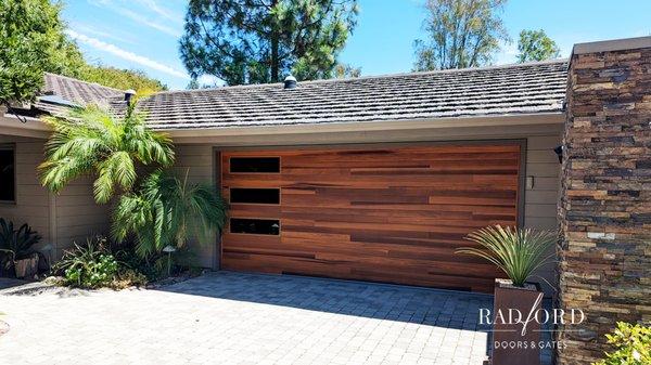 Poway
 Modern Plank
 V-Grooved Style 
 Cedar Smooth Texture
##radforddoorsandgates
#poway 
#garagedoors 
#chioverheaddoors 
#modern