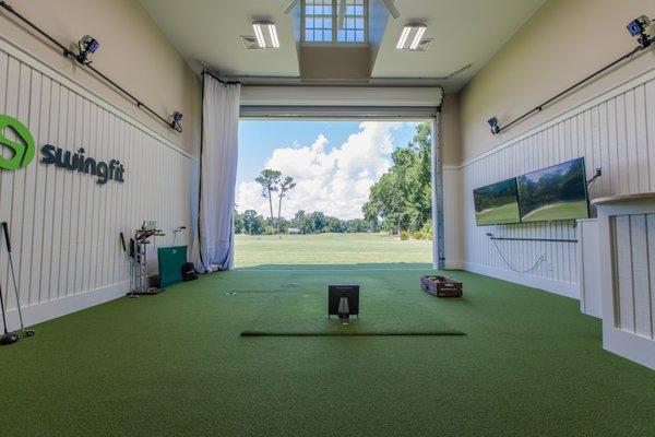 Indoor/outdoor bay allows us to fit in all weather condition while also enabling full ball flight.