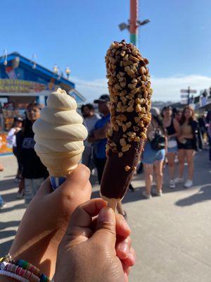 Vanilla soft serve  Chocolate covered frozen banana with peanuts