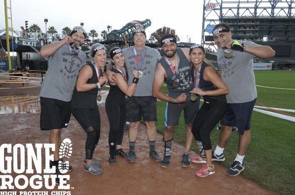 Revampers celebrating the finish of their first Spartan race!