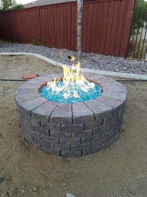 1/2" Azuria and 1/2" Azuria Reflective in my fire pit...along with a round flat pan and burner from American Fire Glass.