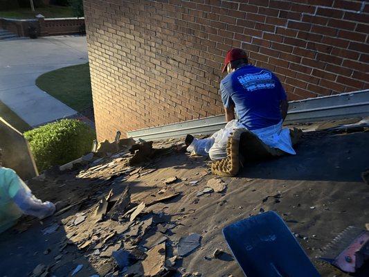 Roof tear off at Mercer university.