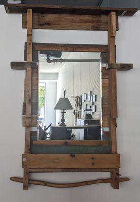 Natural wood bathroom mirror, shelf and towel rack.