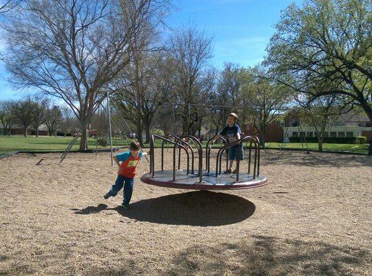 I haven't seen a merry-go-round at a playground for years. Both boys said they had never been on one before.