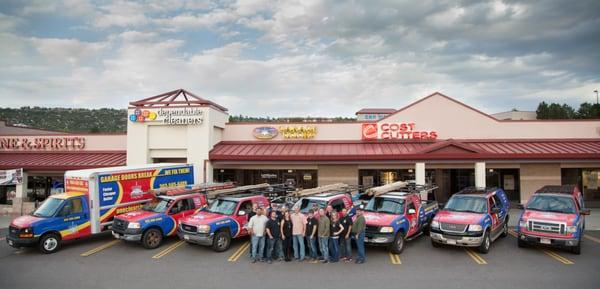 group picture in front of one of our three showrooms