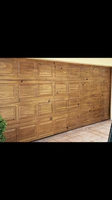 Pecky cypress wood grain finish on garage door