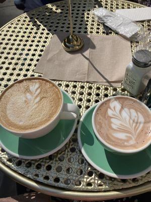 Hot chocolate, latte, salmon egg and cheese on focaccia.