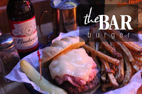 Home of "The Bar Burger" Ham and swiss cheese piled on top of a 1/2 pound burger. Don't forget the fresh cut french fries.