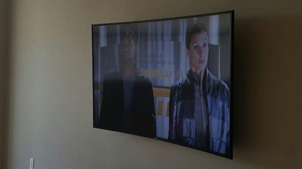 65in curved TV. Installed with directv genie.