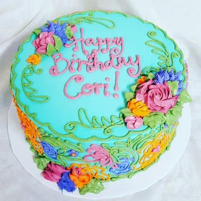 Birthday cake with buttercream flowers.