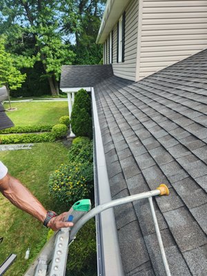 New 6K white gutter plus Hydro Flo leaf guard  the Brandywine Hills neighborhood of Wilmington, Delaware.