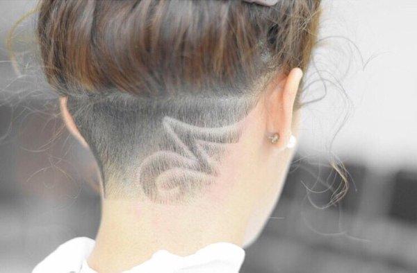 Undercut for a young lady with a small design