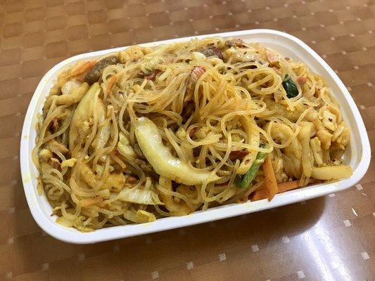 Singapore noodles. Only a suggestion of curry and no spice, so I don't recommend this dish here.