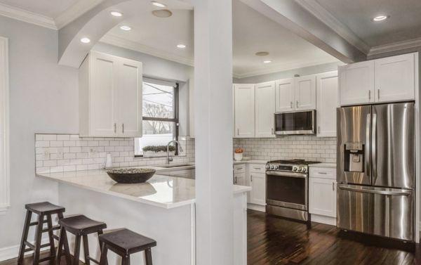 Step into the heart of the home, where sleek design and functionality converge in this stunningly remodeled kitchen