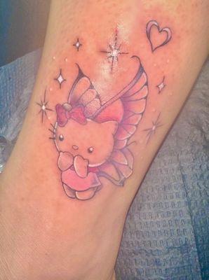 Hello Kitty Fairy tattoo done by Ray