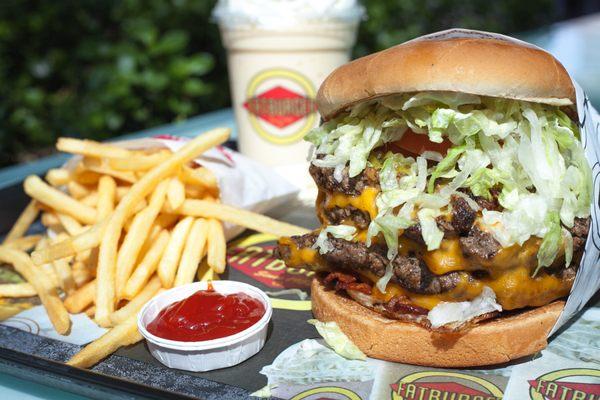 XXXL bacon cheeseburger with skinny fries and a milkshake at Fatburger!