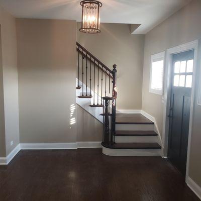 Finshed foyer painting, trimwork and drywall.