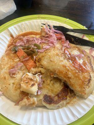 Pupusa revuelta and one of queso