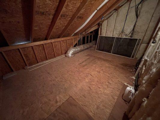 Upstairs attic before they sprayed, you can see light through the shingles