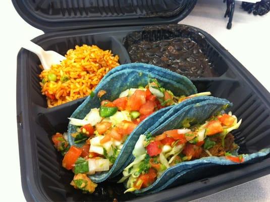 Shredded Pork blue corn soft tacos with avocado sauce