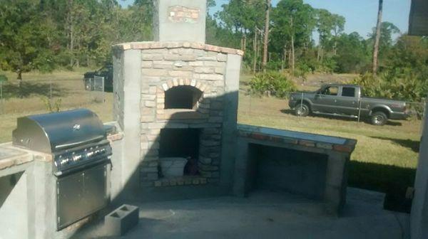 Outdoor kitchen with pizza oven