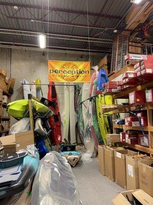 Checking out more Perception kayaks in the warehouse.