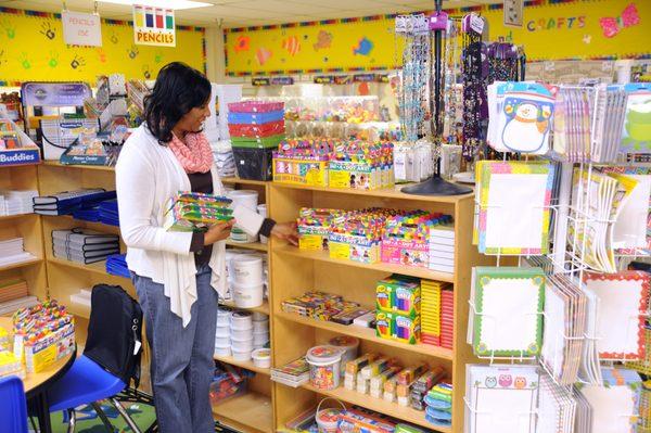 Rhonda, one of the Megastore's sales associates, is stocking and organizing the art supply section of the store.