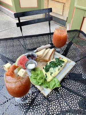 Veggie omelette with roasted mushrooms, red pepper, and spinach and a loaded Bloody Mary!