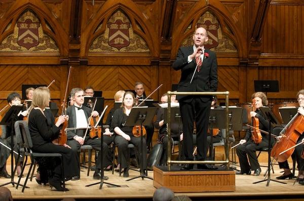 Music Director Kevin Rhodes speaking to the audience