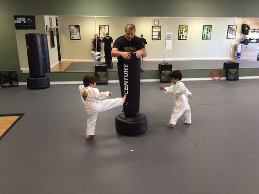 Push kicks on the bag with 3-4 year olds.