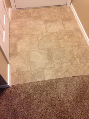 Entryway, so much better then before! They did all the tear out as well as the new tile and we love it!