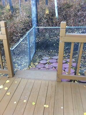 The other side of the deck is what opens into the dog run.