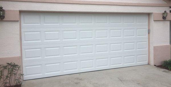 Garage door repair in Palm Coast, Florida by American Overhead Garage Door.