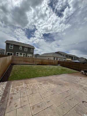 New concrete patio with new landscaping in Lochbuie Colorado