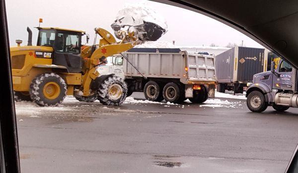 A&J Landscape Services providing snow hauling for one of our commercial customers.