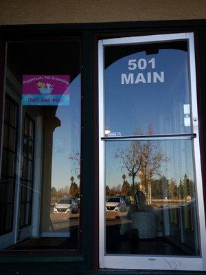 Main Entrance, handicap accessible ramp is in the back of the building.