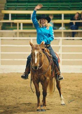 Our Trainer, Brittnee, working with a horse in competition.